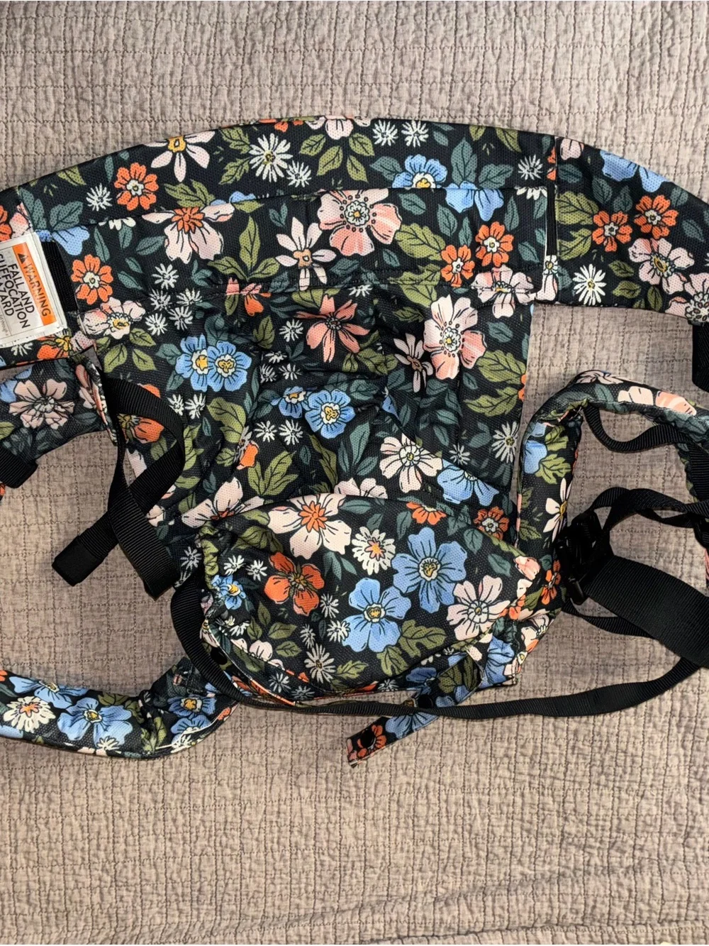 Tula explore Olivia - Black with Blue, Pink, Orange and Green Flowers